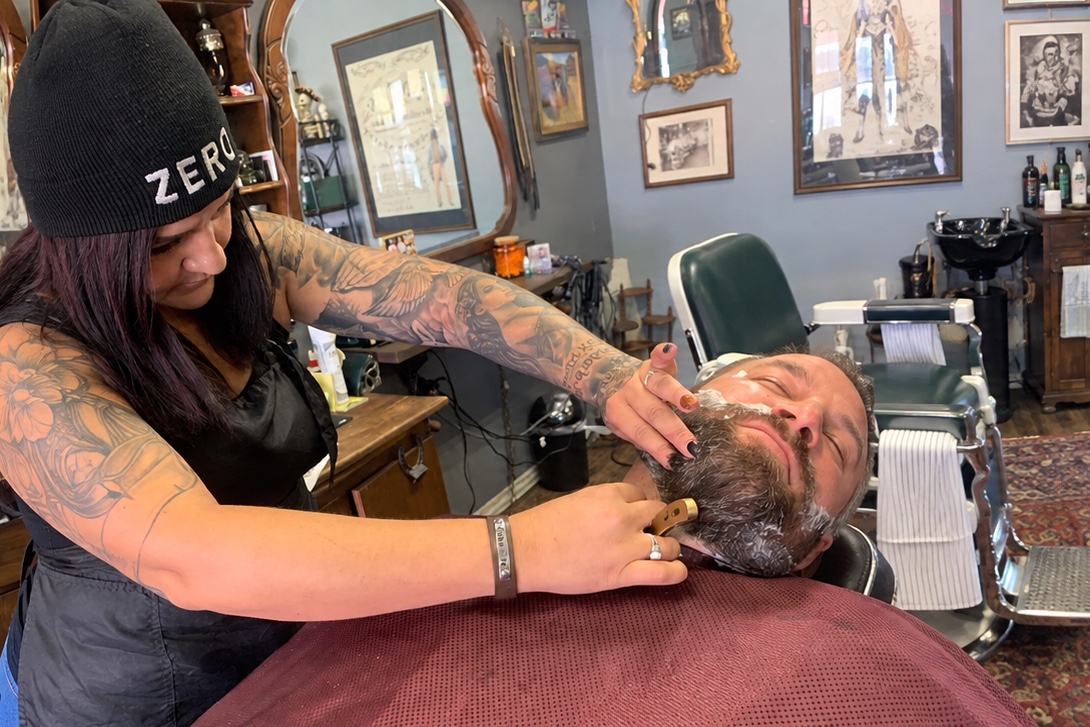 Straight razor shave in Winchester, CA Elizabeth performing a straight razor shave at Truly Blessed Barber Studio in Winchester, California