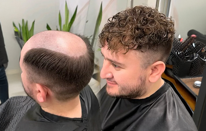 Men's hair systems in Winchester, CA Men's hair system service at Truly Blessed Barber Studio in Winchester, California